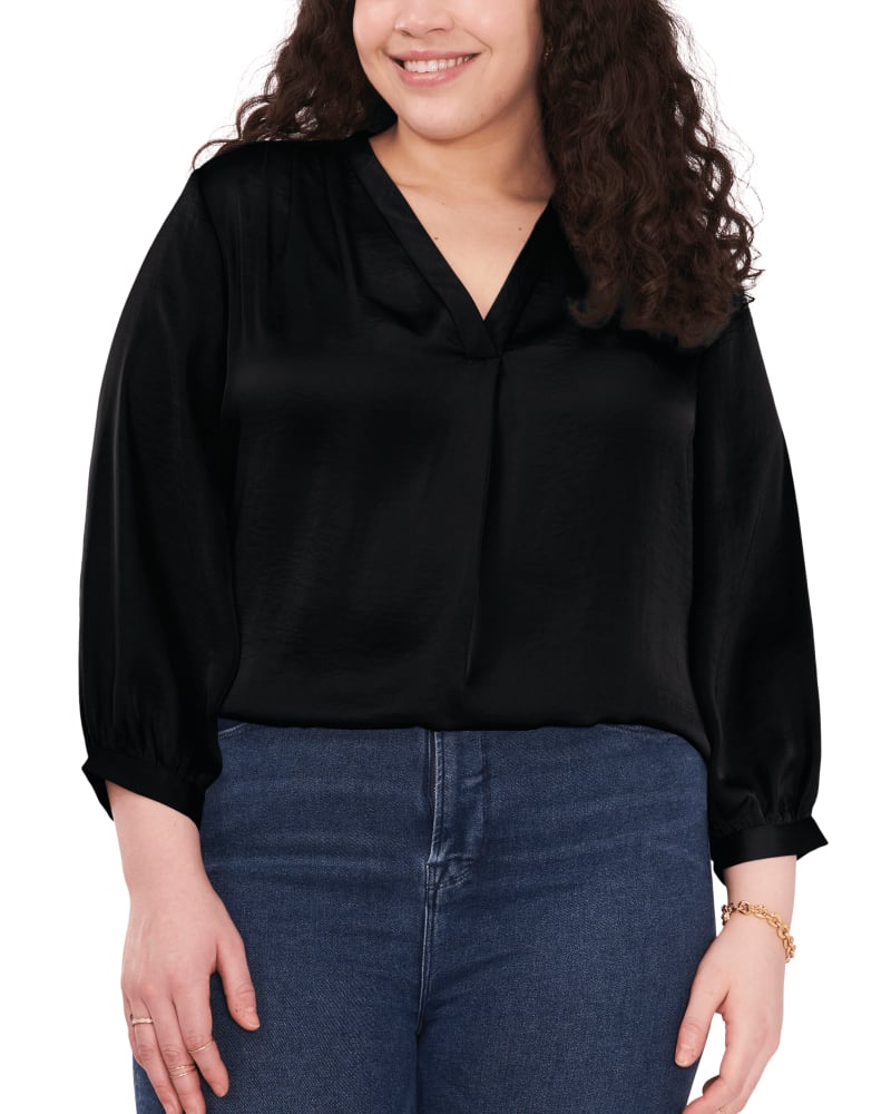 Front of a model wearing a size 1X Everley V-Neck Blouse in RICH BLACK by Vince Camuto. | dia_product_style_image_id:261755